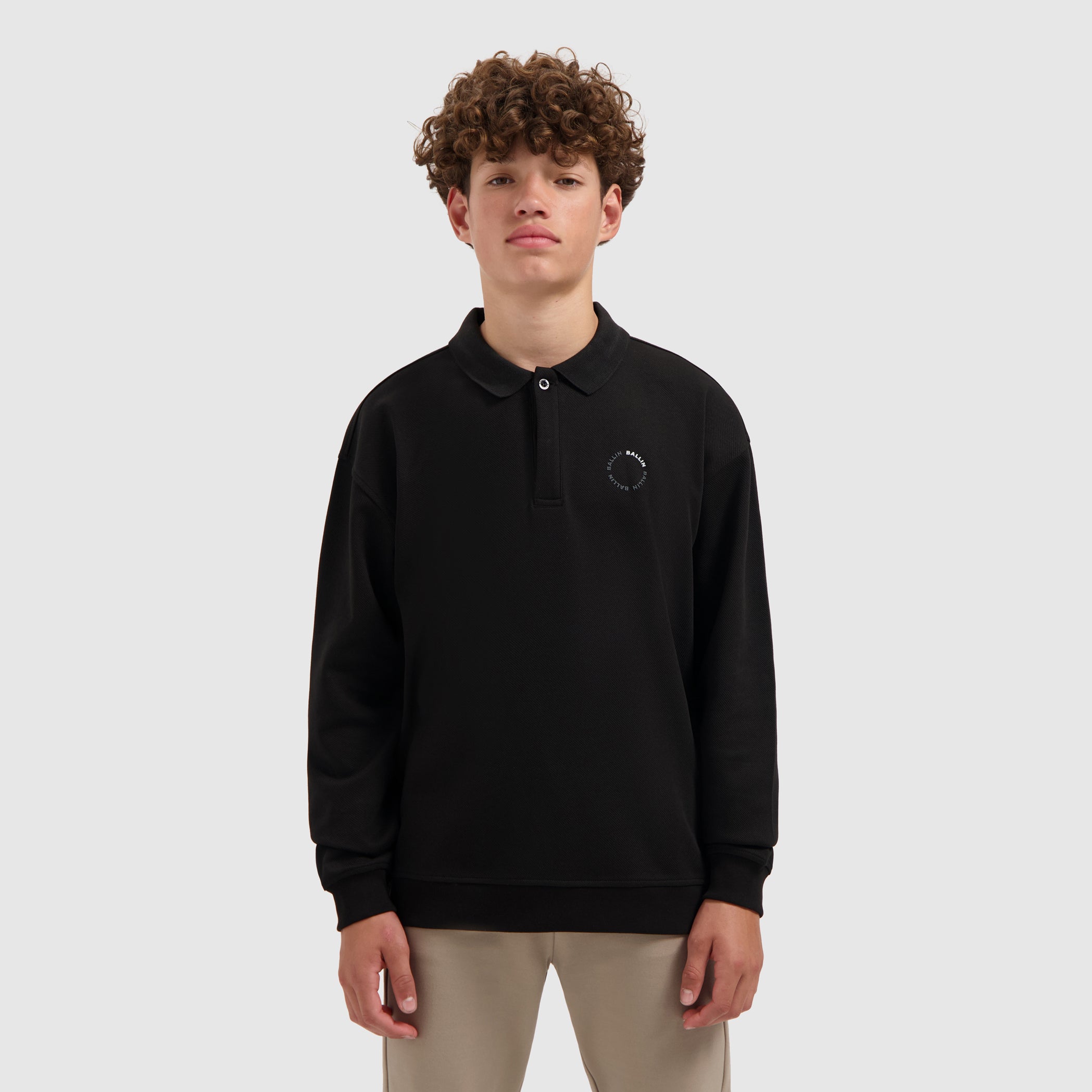 Junior Circle logo Polo Sweater | Black